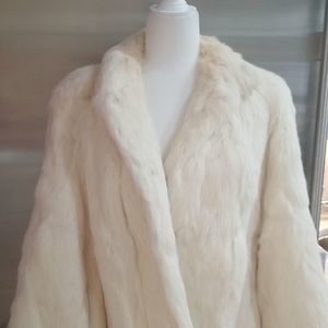 - Women’s 100% white rabbit fur jacket, size medium.